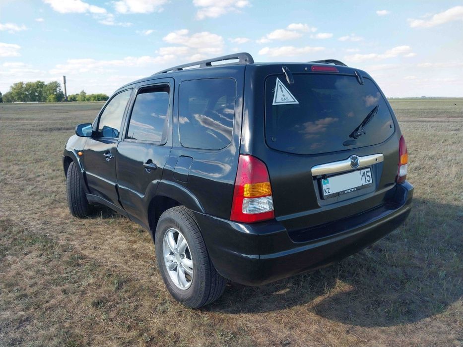 Продам Mazda tribute