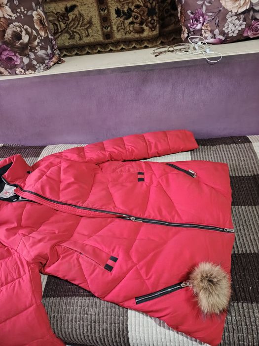 Продаю пуховик зимний отличный