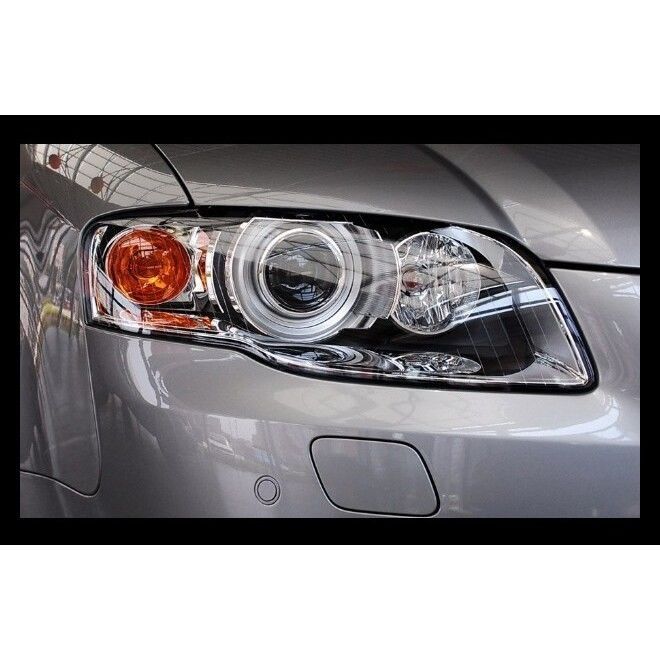 Стекла фар  Audi  A4 B7