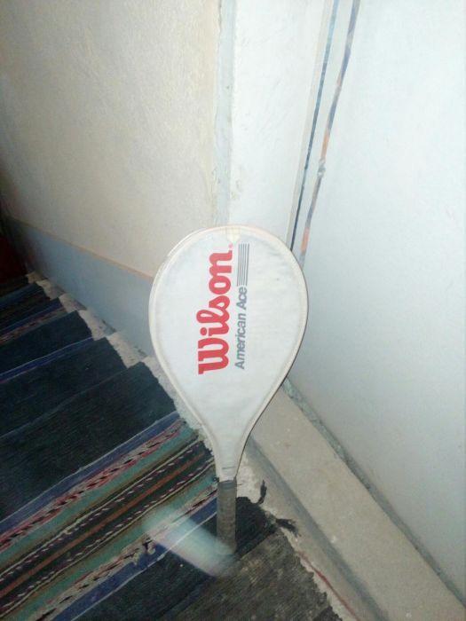 Хилка за тенис на корт