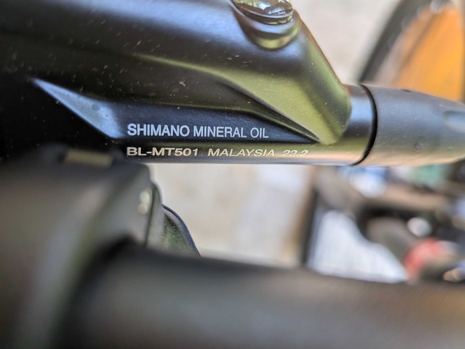 Set frane pentru bicicleta Shimano MT501 cu 2 pistoane hidraulice