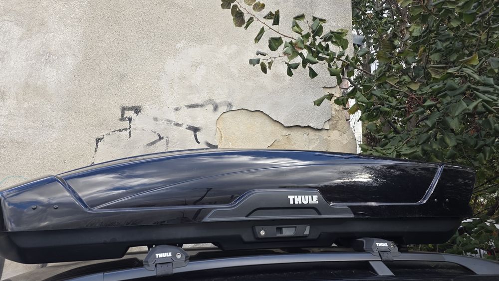 Vand portbagaj Thule.