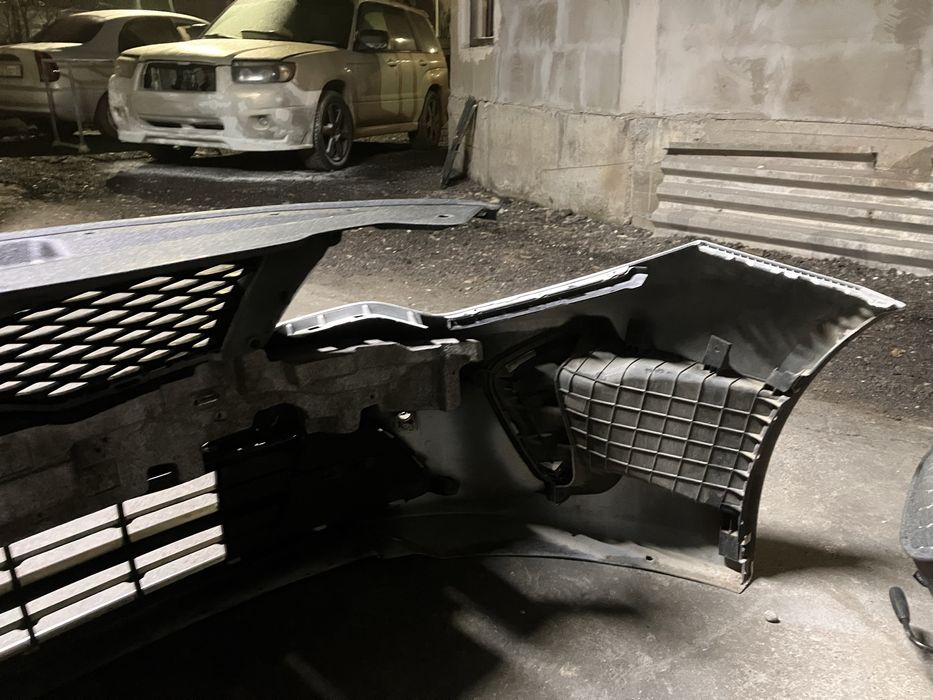 Передний бампер Оригинал