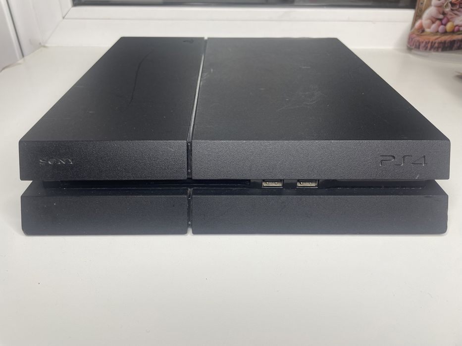PlayStation 4 Slim 500GB + 9 топовых игр