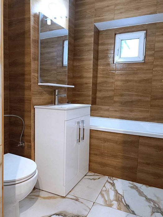 Apartament 4 camere Tomesti la strada principala,100mp, 2 bai