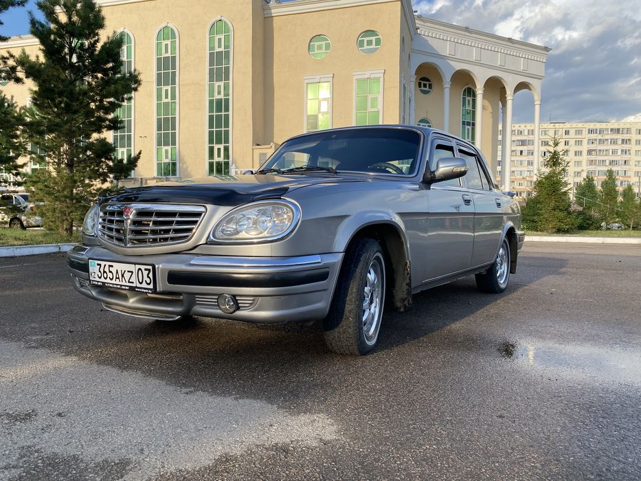 Волга . Газ 31105 .