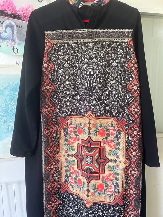 Рокля с мотив на гърба