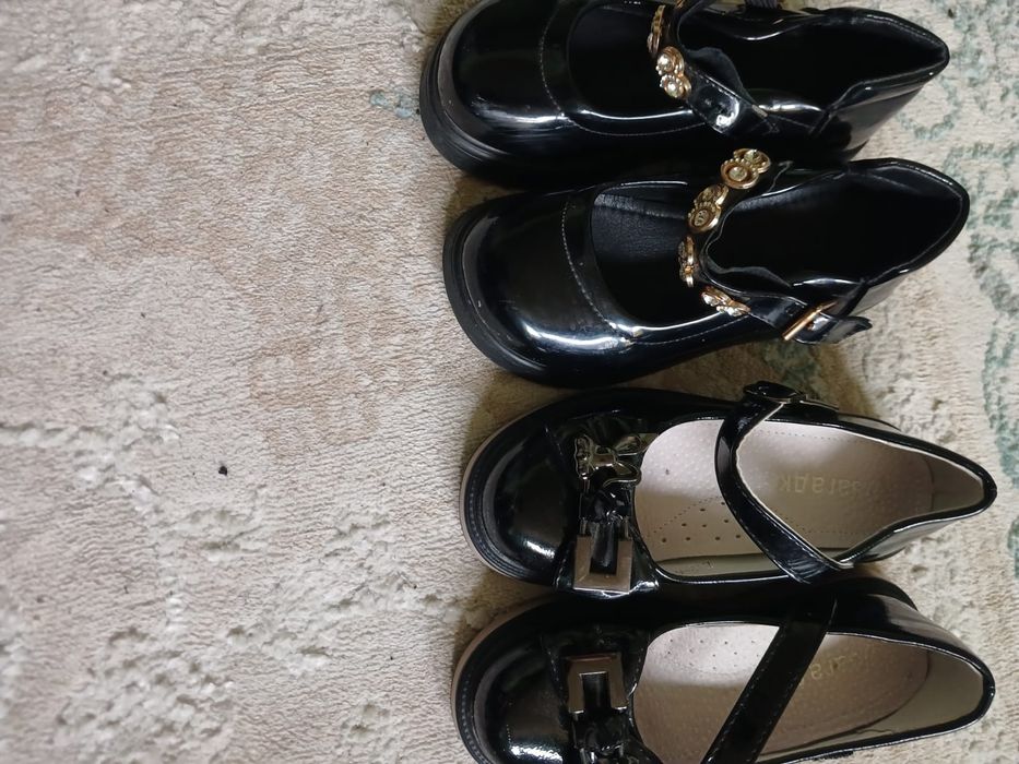 Екі туфли 2000 тг