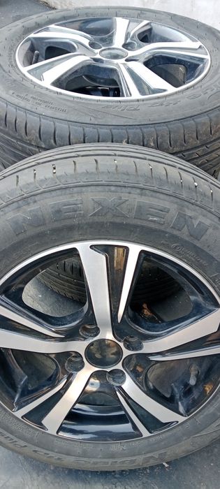 Продам литые диски с летними шинами