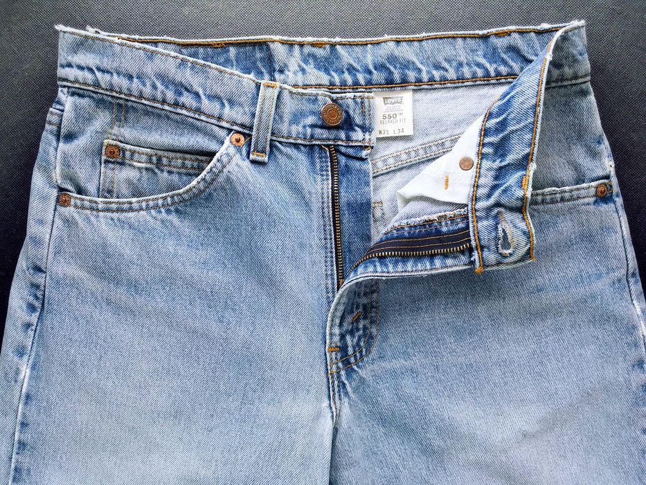 VINTAGE 1997 Made in U.S.A. LEVI'S® 550™ Orange Tab™ Jeans — W31 L32