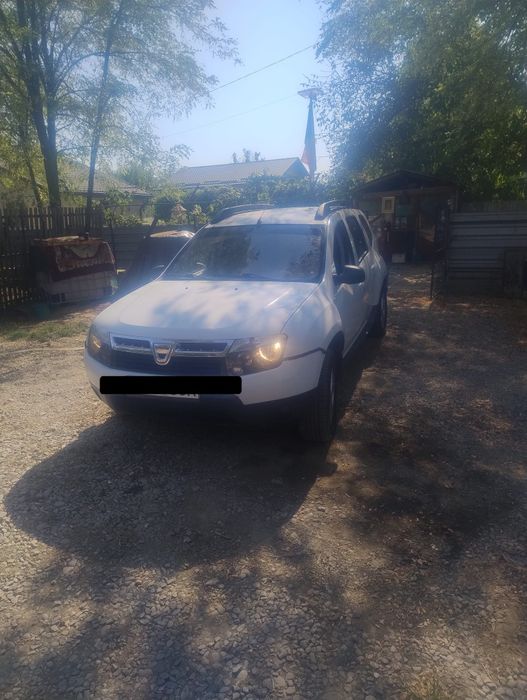 Vand Dacia Duster 2013 sau schimb