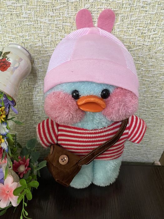 Мягкие игрушки разные.