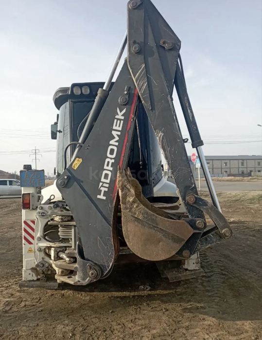 Эксковатор погрузчик услуги аренда