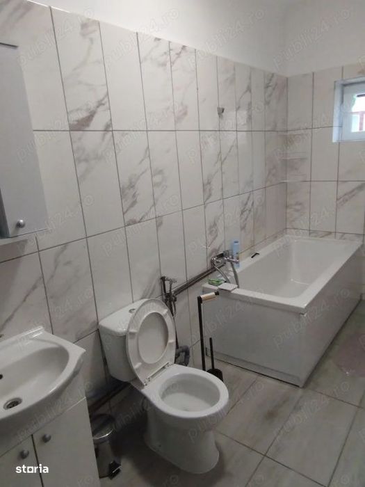 Casa cu doua apartamente si curte zona Turnisor