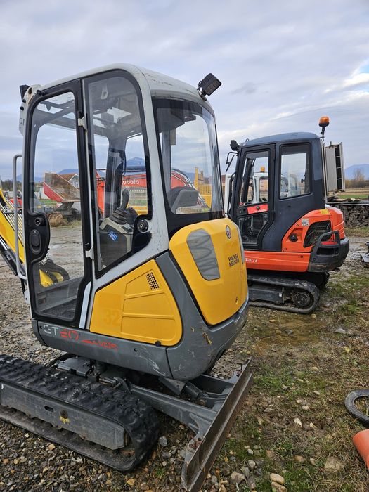 Miniexcavator powertilt