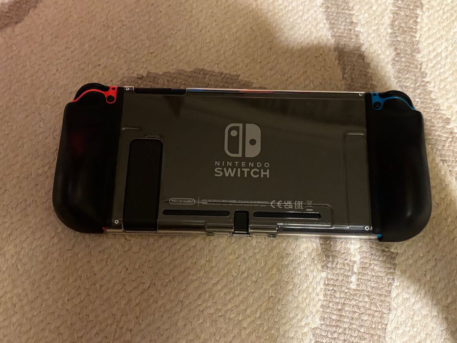 Nintendo Switch V2 + 128 GB + Zelda Controller + Бонус игра“.