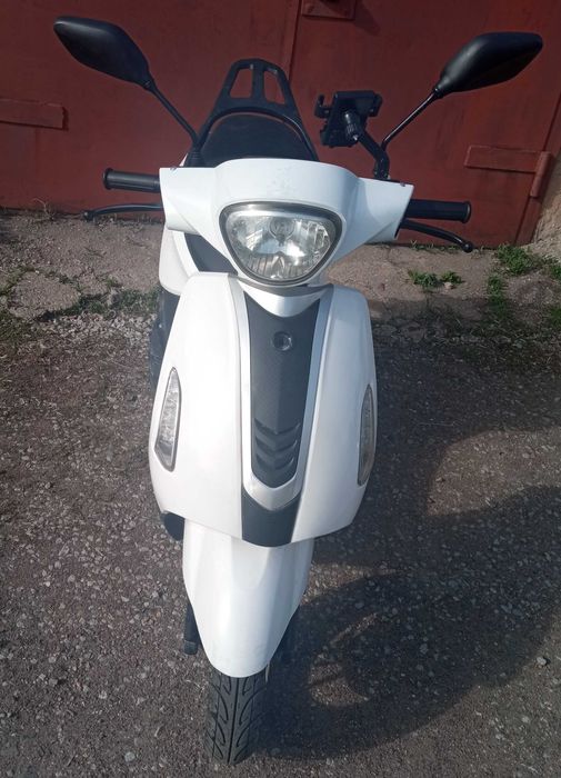 Скутер Almotor .