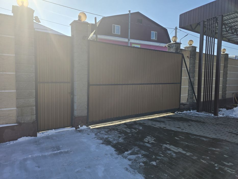 Продам ворота с калиткой раздвижной