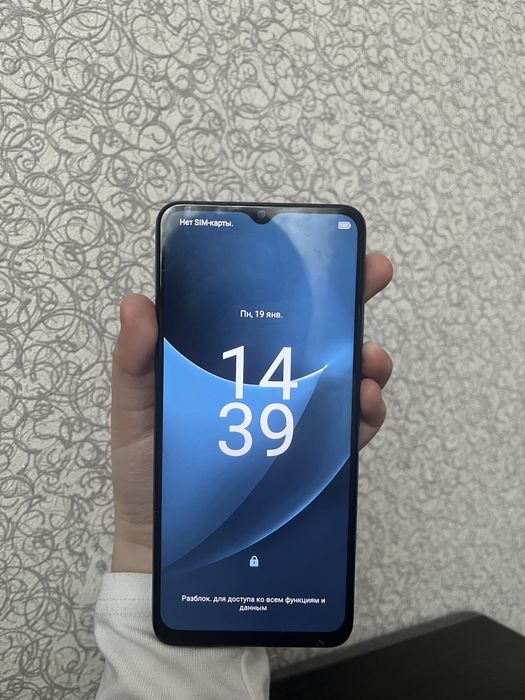 Самсунг телефон.