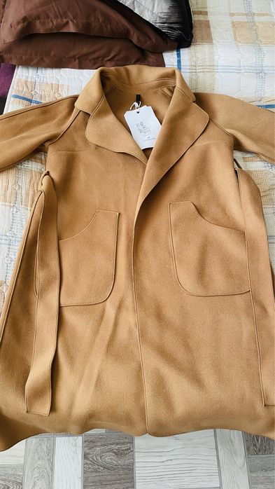 Новая пальто