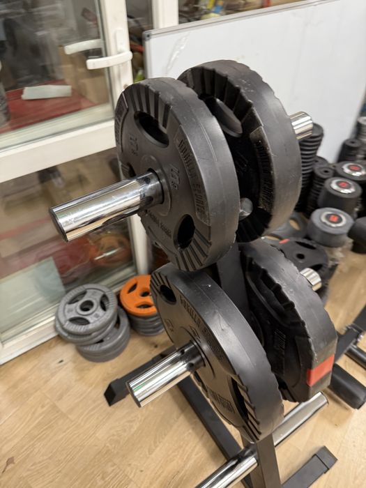 Discuri olimpice haltere si gantere 50 mm Olimpice noi pret 7 lei kg.