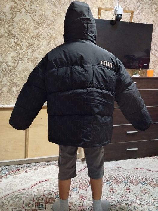 Новый  пуховик рр 150