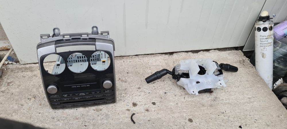 Radio cd,ceasuri bord,manete semnalizări,aeroterma Mazda 5