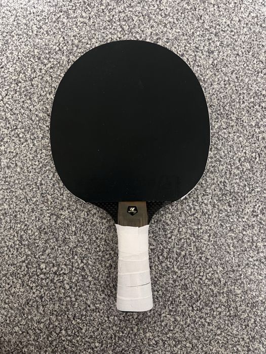 Теннисная ракетка