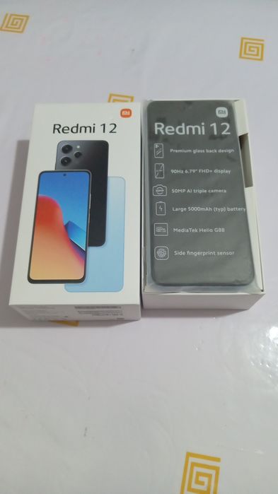 Продаю Телефон редми 12  с докумен коробками.