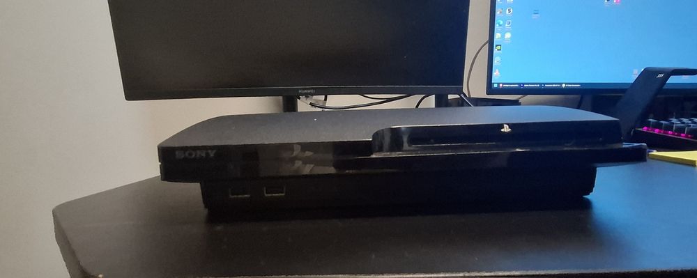 PlayStation 3 Slim Modat cu 47 Jocuri
