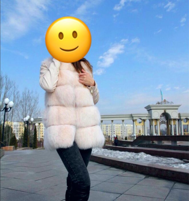Меховая жилетка