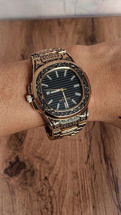 Часы Patek Philippe золотой свет