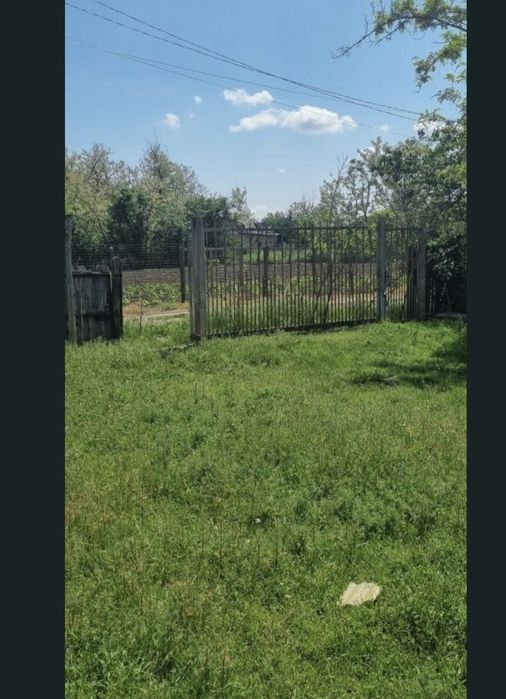 Teren intravilan 1500 mp, dublă deschidere, baltă la 100m de curte – 18.000 €