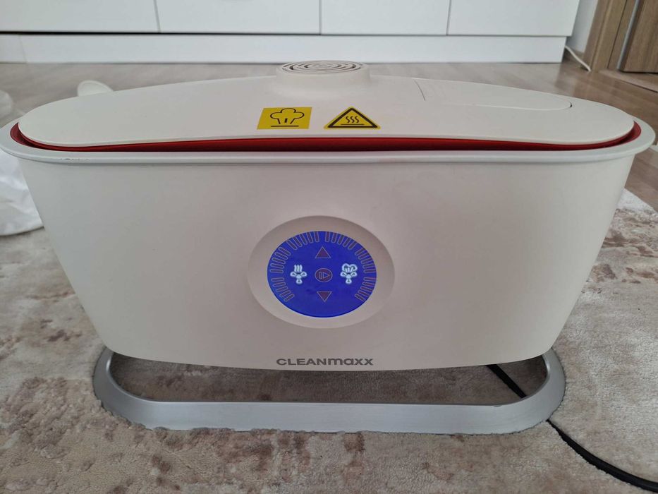 Aparat pentru uscarea şi calcarea rufelor