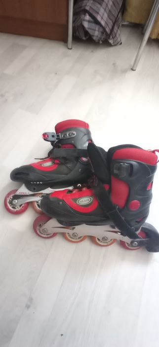 Роликовые коньки