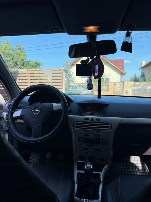 Vand masina opel astra