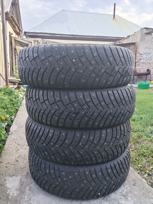 Шины зимние шипованные. б/у