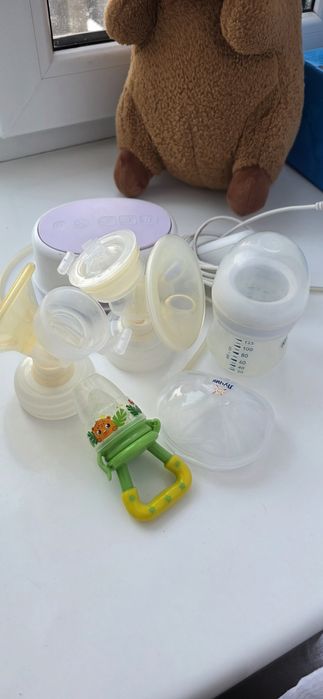 Электрический молокоотсос