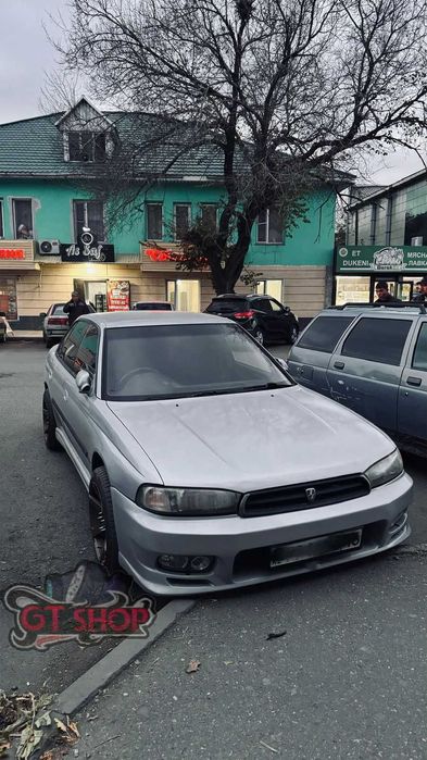 Передний обвесной бампер Subaru Legacy B3