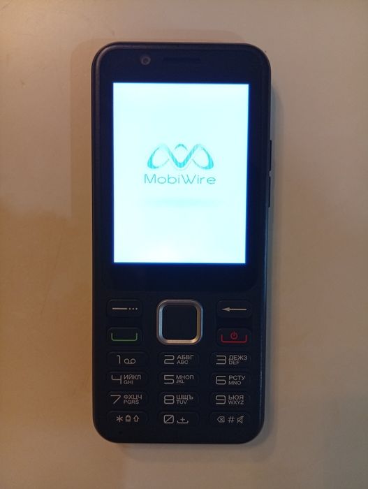 Телефон с копчета  : Mobi Wire