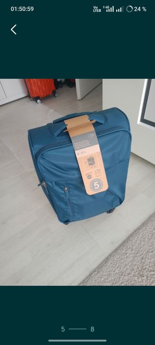 Vând troler material textil,dimensiune de 55 cm,nou, produs calitate.