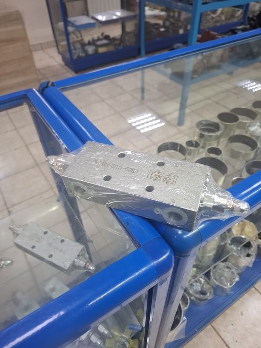 Распределители Насосы гидрозамки