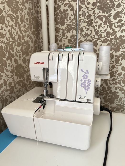 Оверлог janome.