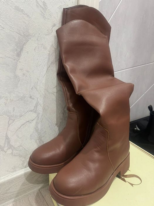 Продаеться сапоги