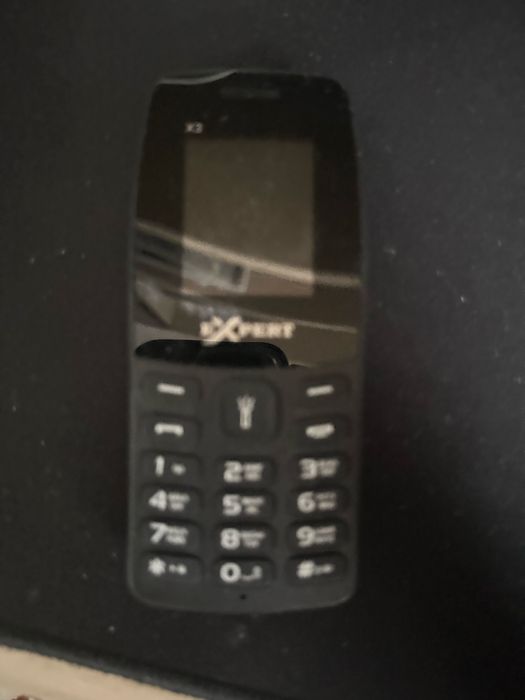 кеопочный телефон