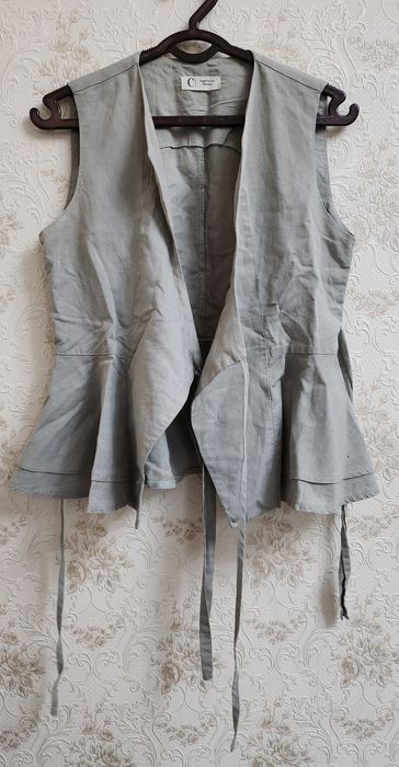 Оливковая жилетка