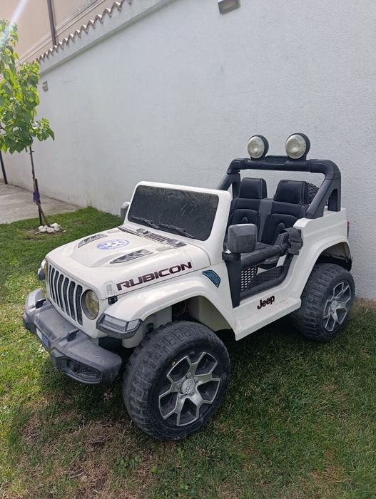 Mașinuță electrica cu telecomanda și pedale .2+ jeep rubicon
