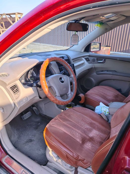 Kia Sportage 2 поколения