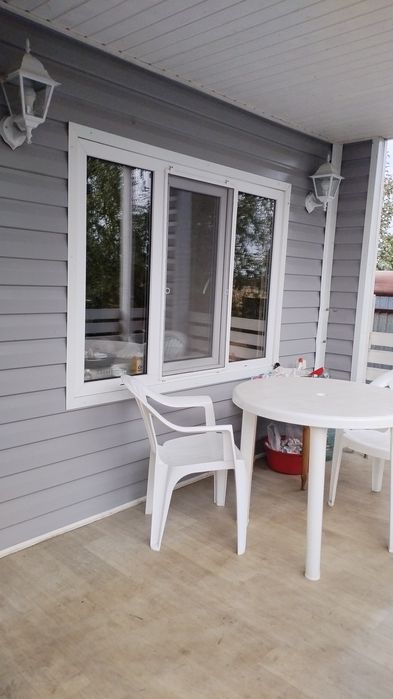 Обшивка фасада сайдингом, профлистом