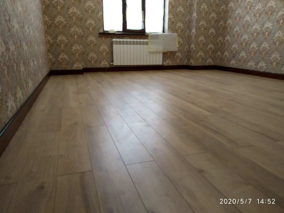 Качественная установка ламината и заливка наливного пола.